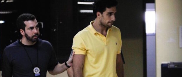 'Playboy' José Phillipe Ribeiro de Castro sendo preso. Foto: O Globo
