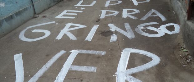 "The UPP is for the Gringo to see," written on a street of Complexo do Alemão in August 2014
