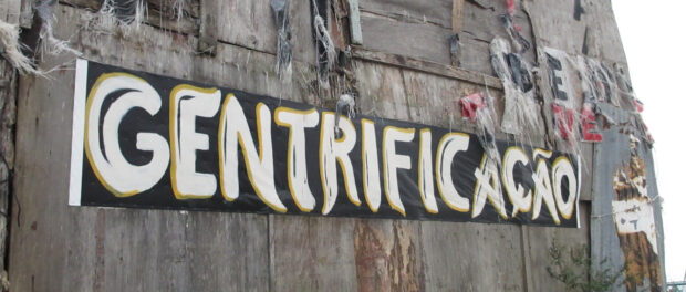 "Gentrification" banner in Santa Marta