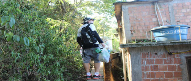  Vidigal Trails guide Russo Morais brings trash down from Dois Irmãos (Photo from Vidigal Trilhas / Morro Dois Irmãos RJ facebook page)