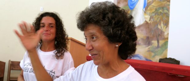 Maria da Penha and Sandra Maria tell the story of the community's resistance from inside the Catholic Church