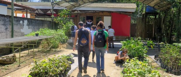Community leaders visiting the Onda Verde greenhouse
