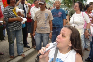 Sheila speaks in front of City Hall, at the closing of the parade