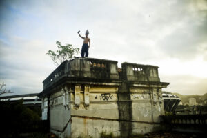 An member of the Aldeia Maracanã occupation atop the former Indigenous Museum. Photo by Mídia NINJA