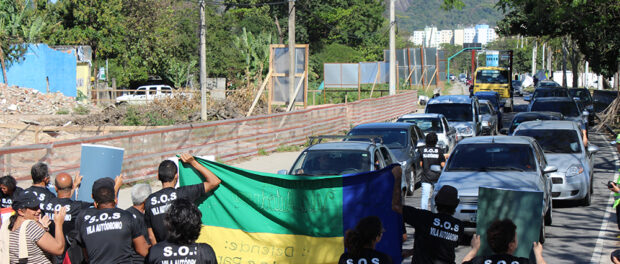 Protesters stop the traffic to make themselves heard by motorists.