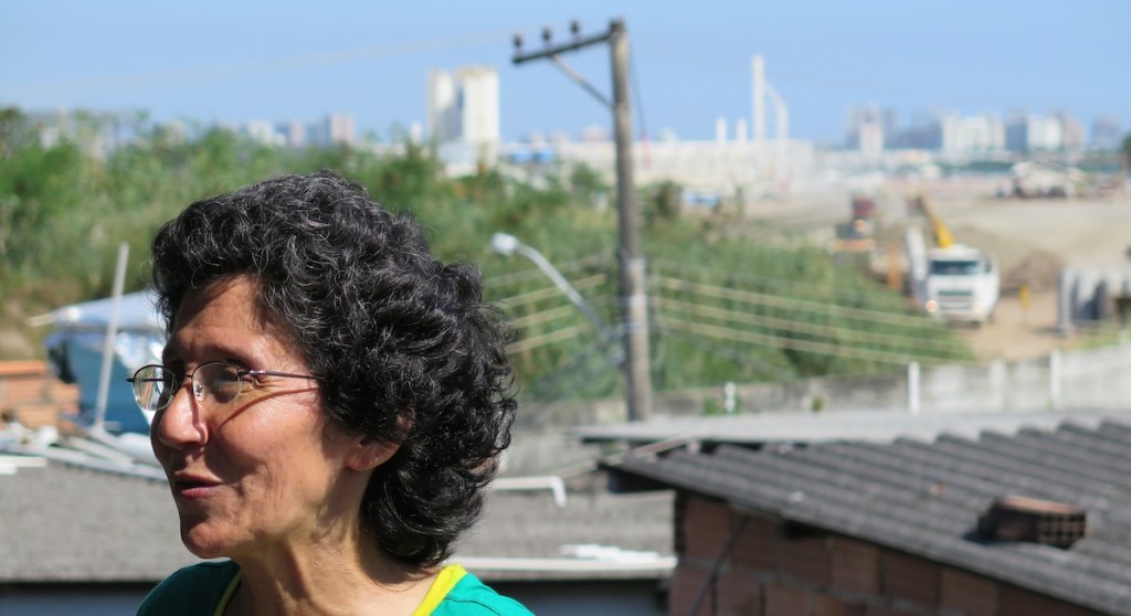 Maria da Penha looks out from her rooftop