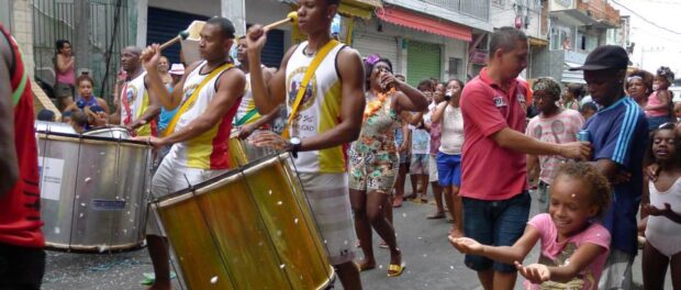 Unidos do Complexo do Alemão walking through Nova Brasília in an act of resistance. Photo: Charlotte Livingstone