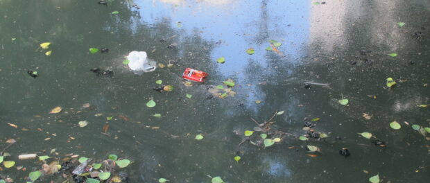 Bubbling, toxic water in the canal on Avenida Visconde de Albuquerque in Leblon. The canal was created to keep Leblon beach clean of trash and pollution and stands as a symbol for the government's skewed priorities in terms of water allocation an infrastructure.