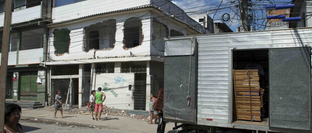 Moving trucks have become a common sight along the neighborhood’s edge.