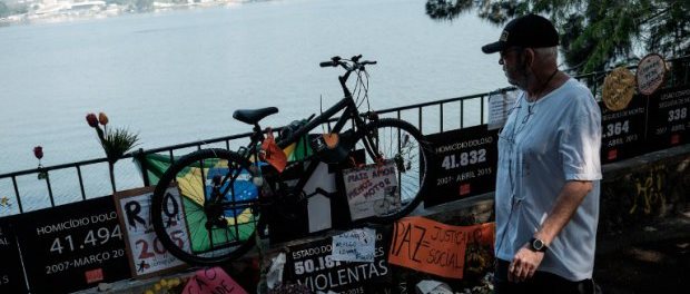 An improvised memorial for a cardiologist stabbed for his bike. Image credit: AFP / Yasuyoshi Chiba