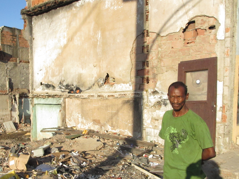 Pedro Paulo in front of his demolished home