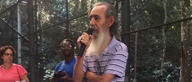 Sr. Martins, Rocinha leader and activist, speaks at the event