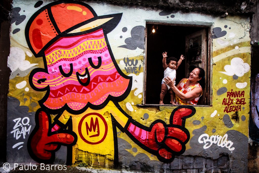 Paulo Barros, “Meeting of Favela 8” – documenting ‘MoF’ 8th edition, one of the biggest graffiti event at Vila Operária favela, Duque de Caxias: world-record mutirão (collective volunteering) by hundreds of artists hip-hop various disciplines, sided by social projects like health checks (01/12/2013). Paulo Barros, “Meeting of Favela 8” – documenting ‘MoF’ 8th edition, one of the biggest graffiti event at Vila Operária favela, Duque de Caxias: world-record mutirão (collective volunteering) by hundreds of artists hip-hop various disciplines, sided by social projects like health checks (01/12/2013).