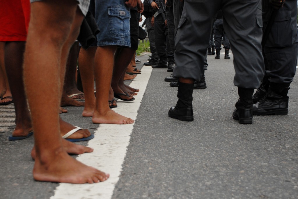“Wall,” taken as Maré residents shut down a highway in memory and protest of police killing a 16-year-old resident, six years prior. Photo by Naldinho Lourenço, April 14, 2009.