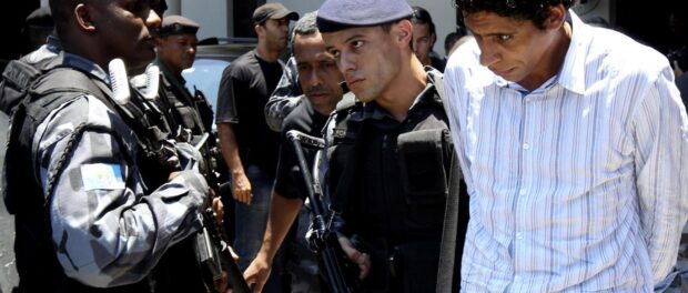 Police arrest Nem in 2011. Photo by Reuters/Stringer