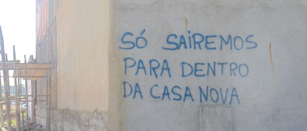 "We'll only leave when we're in our new homes" Graffiti in Vila Autódromo "We'll only leave when we're in our new homes" Graffiti in Vila Autódromo
