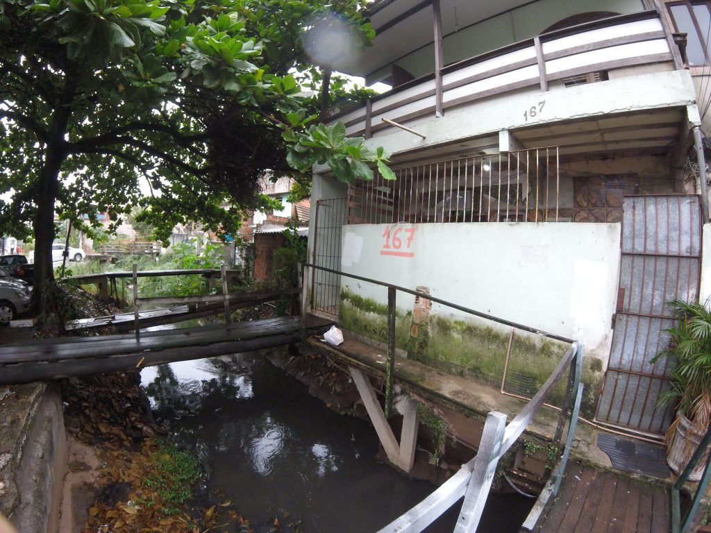 The small stream that leads to Daniel's home was once covered by a concrete bridge until the City demolished it.