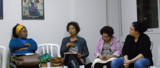 Mônica Sacremento speaks at an event organized by CAMTRA (Casa da Mulher Trabalhadora) in June.