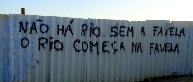 Owner of the last original house standing, Delmo, is responsible for some of Vila Autódromo's protest graffiti. This one reads—There is no Rio without the favela. Rio begins in the favela.