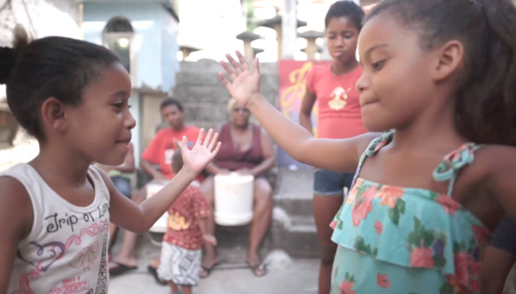 Children practicing jongo. Film still from Jongo Fever