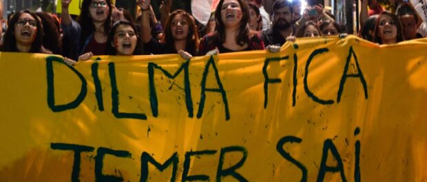 Protesters fight the impeachment of PT's Dilma Rousseff in August 2016.