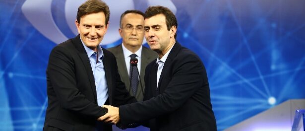 Marcelo Crivella (left) advocated for reducing public spending at the mayoral debate against Marcelo Freixo (right) on Oct. 7 Marcelo Crivella (left) advocated for reducing public spending at the mayoral debate against Marcelo Freixo (right) on Oct. 7