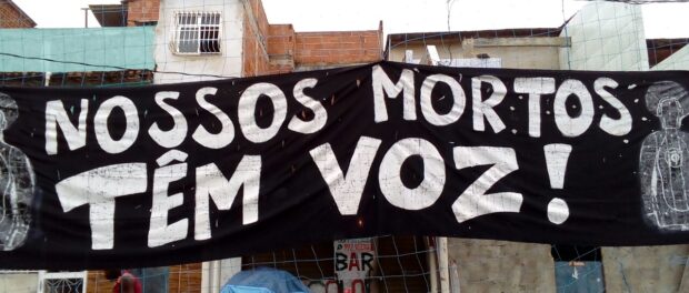 Banner expressing commitment of the mothers to speak out: "Our dead have a voice!"