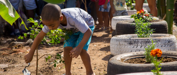 Enzo Helping in the Planting - Photo by Diogo de la Vega