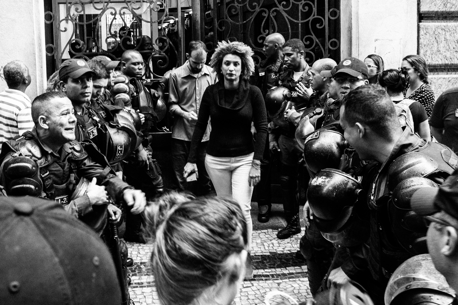 Marielle Franco leaving the Rio de Janeiro City Council on October 26, 2017. “She existed, she resisted, and she 'got there'. 'There' where fear becomes a verb, turns into action, turns into being seen." Photo by Bárbara Dias / Fotoguerrilha