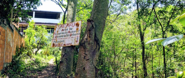 Sign marking the Area of Environmental Protection and Urban Recuperation (APARU) designation of the Serra da Misericórdia.