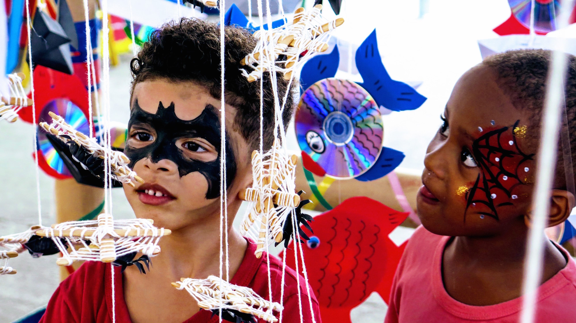 Children play at Eco Rede's installation made from recycled materials