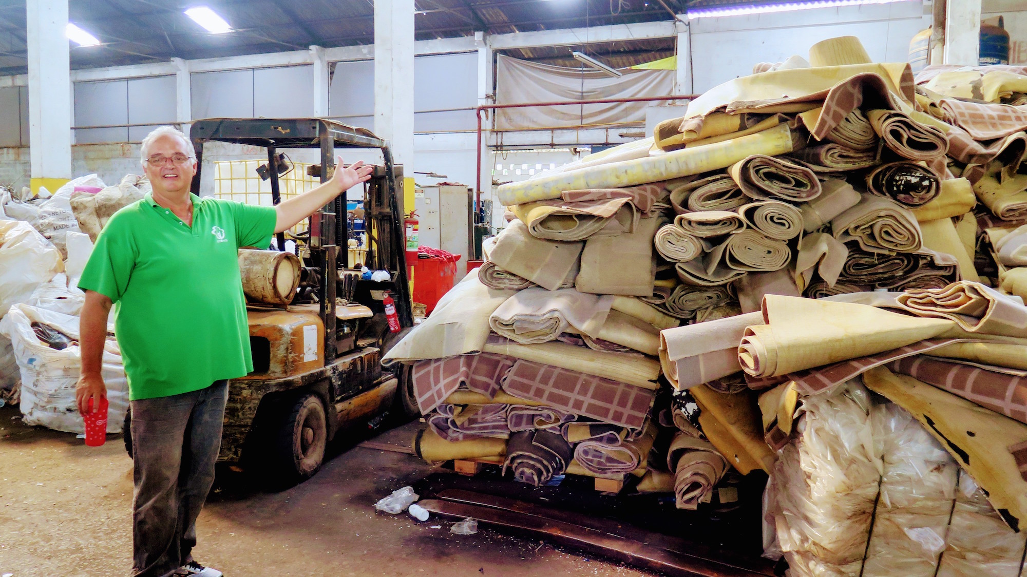 Edson shows large pile of hotel carpet to be recycled into profit