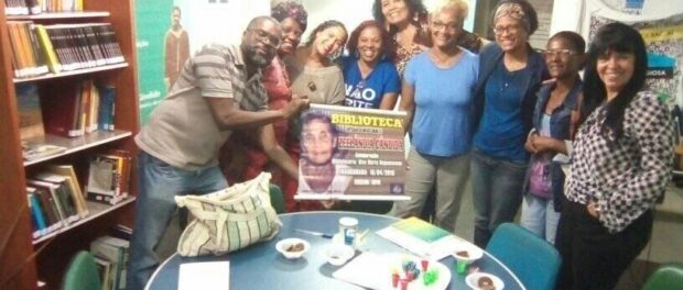 Activists and Solange Lage a consultant to the Municipal Secretariat for Culture, Leisure, Human Rights and Racial Equality of São João de Meriti, at Zeelandia Cândido Library.