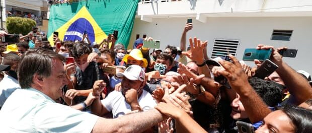 Jair Bolsonaro is greeted by supporters in Coremas, Paraiba state, northeast Brazil, last September. Photo: Brazilian Presidency/Reuters